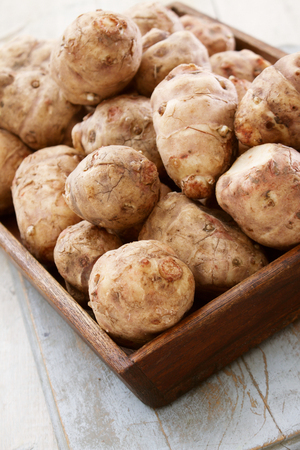 preparing jerusalem artichokeの写真素材