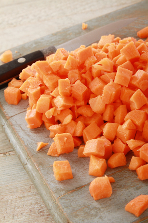 preparing diced  carrotの写真素材