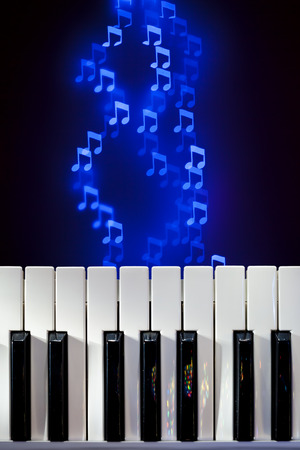 Piano Keyboard with Bokeh Notesの写真素材