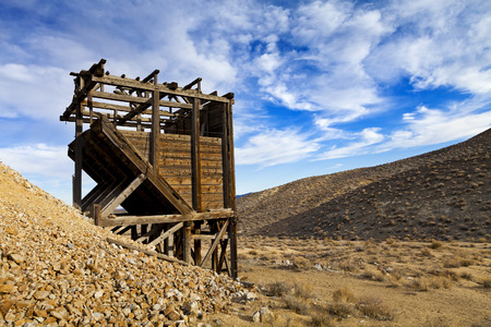 Old wooden mine workings in the Nevada desert. Head frames and bins were used to raise and sift materials.の写真素材