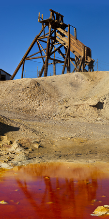 Old wooden mine workings in the Nevada desert. Head frames and bins were used to raise and sift materials.の写真素材