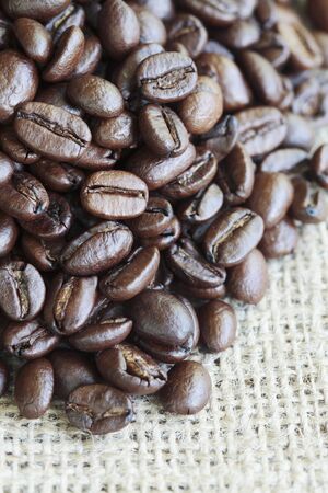 Coffee Beans on Burlap Sackの写真素材
