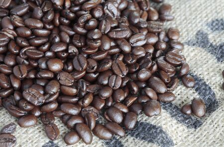 Coffee Beans on Burlap Sackの写真素材