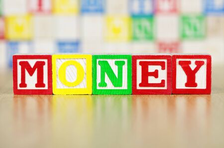 Money Spelled Out in Alphabet Building Blocksの写真素材