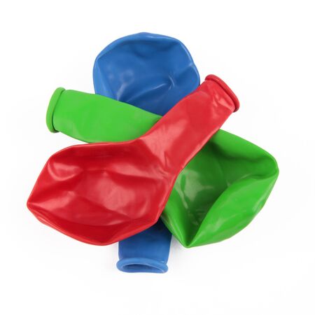 Deflated red, green and blue Balloonsの写真素材