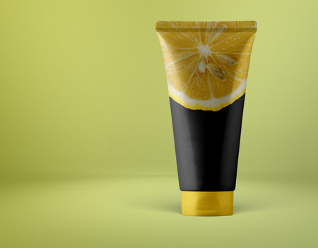 Lemon cosmetic tube on green background. 3d rendering illustration.の写真素材