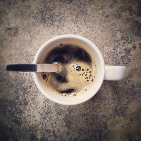 Top view from a cup of black coffeeの素材