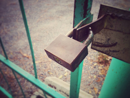 Old lock locked a gateの素材