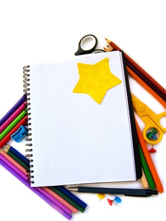 blank note book with school suppliesの写真素材
