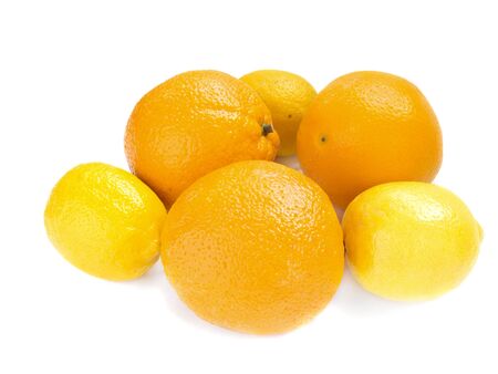 Fresh oranges and lemons isolated over whiteの写真素材