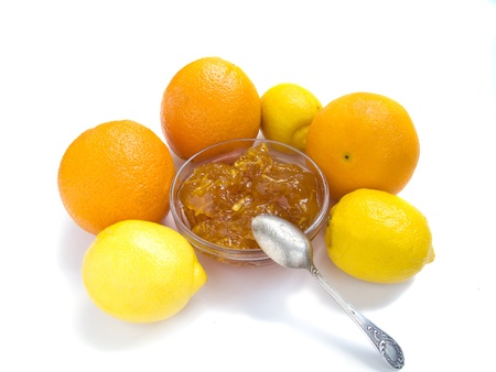 citrus jam with orange and lemon isolated over whiteの写真素材