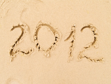 written on sand 2012 new year sign