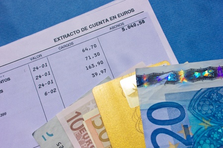 pile of euro baknotes  with plastic card  on bank accountの写真素材