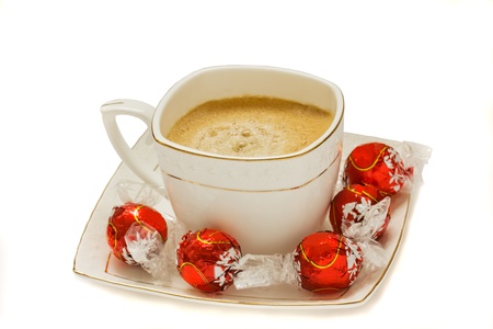 cup of coffee americano with sweets isolated on white backgroundの写真素材