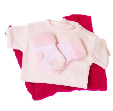  pink baby clothes isolated on white backgroundの写真素材