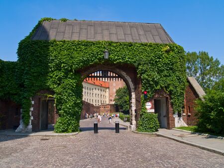 gate to royal castle at Wawel hill, Krakow, Polandの写真素材