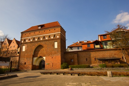 Monastery  tower  gate and city walls, Torun, Polandの写真素材