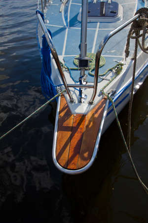 Sailboat detailed parts, close up  winch and rope of moored yacht