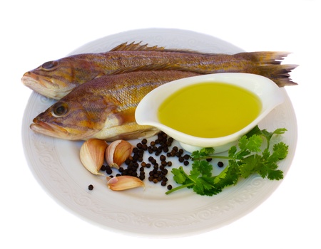 raw fish with ingridients of cooking  isolated on white background