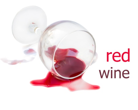 spilled glass of red wine isolated on white backgroundの写真素材