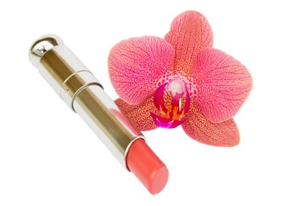  lipstick with pink orchid flower  isolated on white backgroundの写真素材