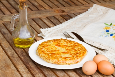 spanish potato omelette tortilla, served on wooden tableの写真素材