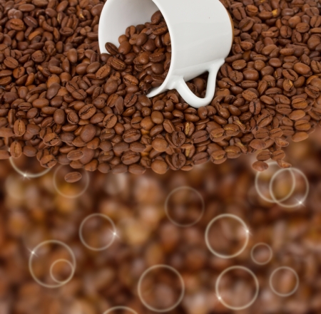 coffee background  - empty cup of coffee  with raw beansの写真素材