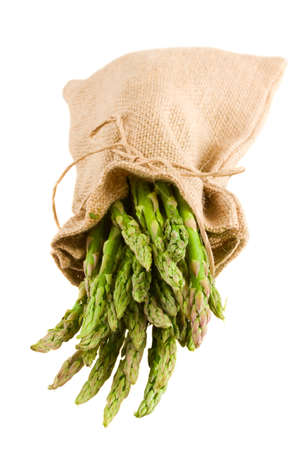 green asparagus sprouts in pouch  isolated on white backgroundの写真素材