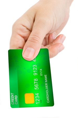 woman hand giving credit card isolated on white backgroundの写真素材