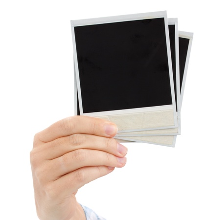hand holding  instant photo  isolated on white backgroundの写真素材