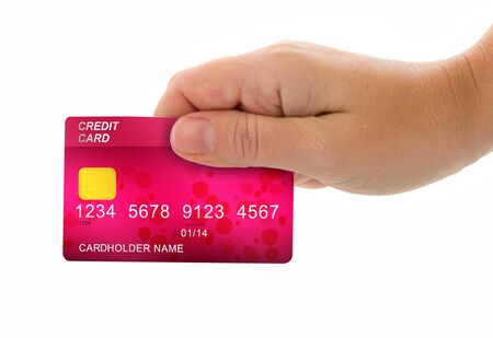 female hand holding credit card for payment isolated on white backgroundの写真素材