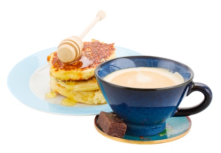 breakfast with pancakes and cup of coffee isolated on whiteの写真素材