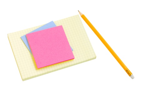 pile of notes with pencil isolated on white backgroundの写真素材