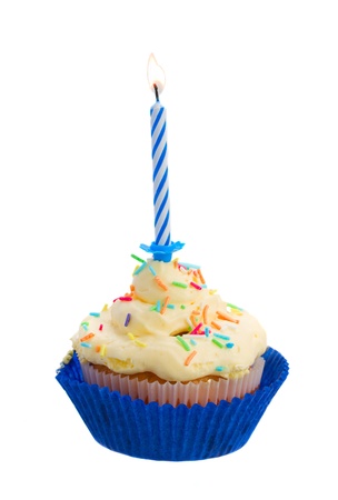 birthday cake with burning one candle isolated on white backgroundの写真素材