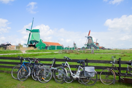 dutch windmills with bikes  in Zaanse Schans, Hollandの写真素材