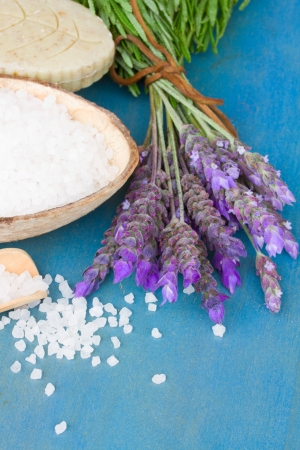 Lavender spa - fresh flowers and aromatic salt on blue  tableの写真素材