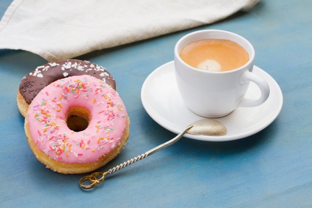 breakfast with donuts and cup of espresso coffeeの写真素材