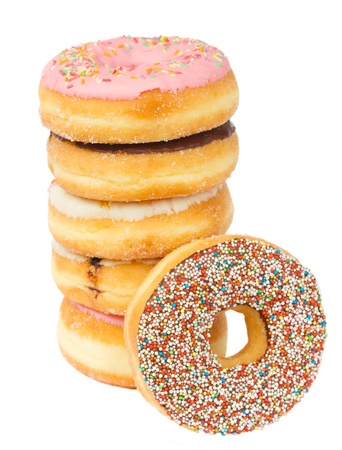 tower of fresh  donuts isolated on white backgroundの写真素材
