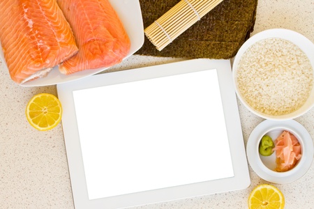 blank tablet for recipes with fresh salmon and riceの写真素材