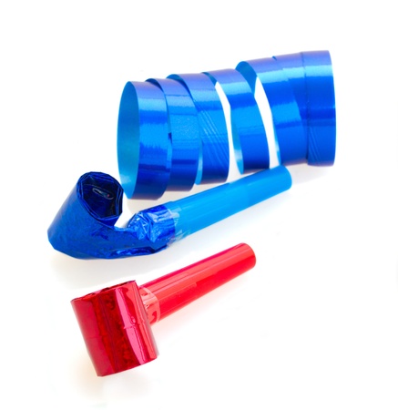 Party Decoration  - whistles and curling paper isolated on whiteの写真素材