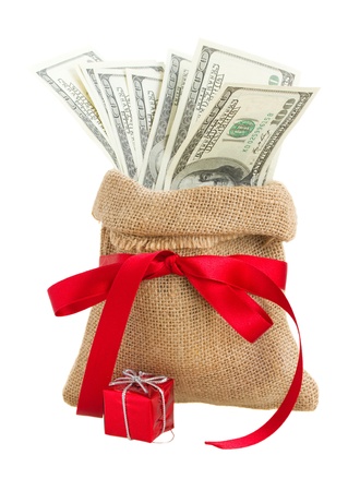 money in gift bag with red bow  isolated on white backgroundの写真素材