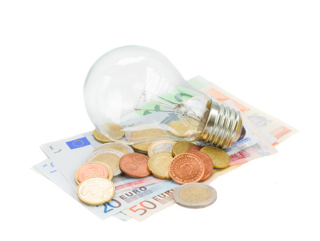 common  lamp bulb on euro money  isolatd on whiteの写真素材