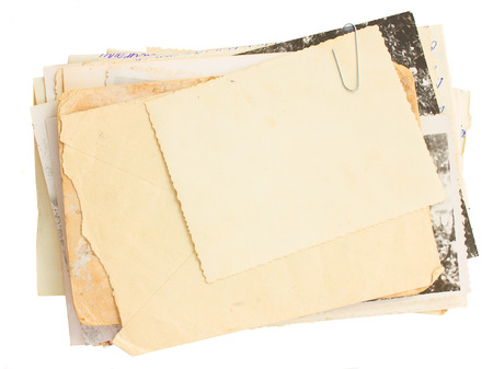 pile of old mail and old photos  isolated on white backgroundの写真素材