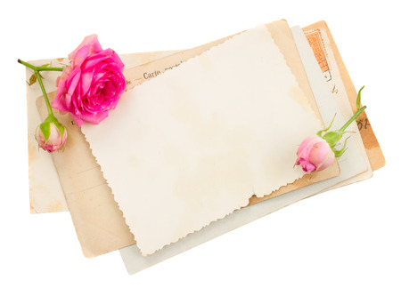 bunch of old papers with rosesの写真素材