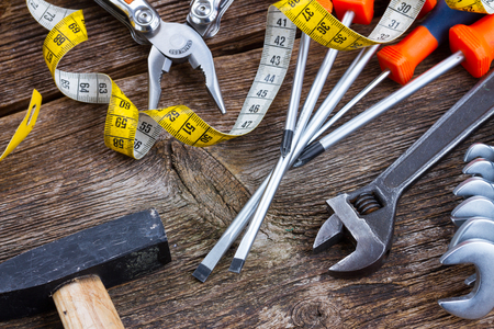 tools kit frame on wooden planksの写真素材