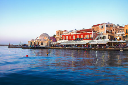 venetian habour and Turkish Mosque Yiali Tzami of Chaniaのeditorial素材
