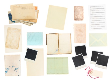 aged aged paper sheets, books, pages and old instant photo  isolated on white backgroundの写真素材