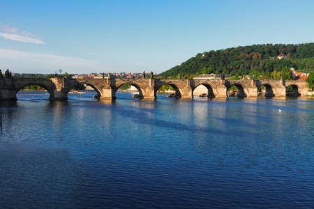 Charles bridge over river Vltava at sunny day, Prague, Chech Republicの写真素材