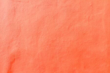 textutre of concrete red painted wall backgroundの写真素材
