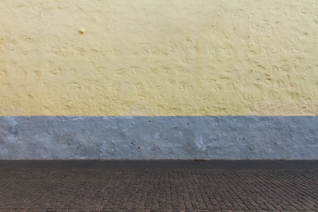 textutre of brick yellow wall background outdoorの写真素材